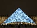 Des images du musée Abu Dhabi sur la pyramide du Louvre