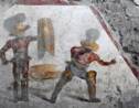 Une fresque montrant deux gladiateurs en plein combat découverte dans les ruines de Pompéi