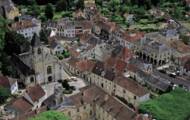What places should you visit in La Roche-Guillon, which is considered the most beautiful village in France?