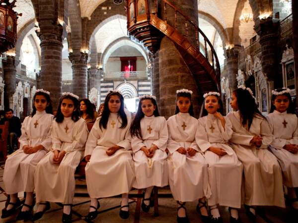 Répétition de la célébration de la communion des enfants, dans la cathédrale al-Zeitoun, à Damas (Syrie).